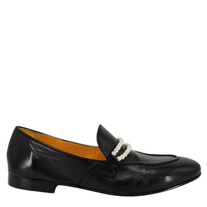 Black loafer shoe with pearl embellishment on a white background
