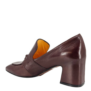 Brown leather shoe with a block heel on a white background