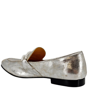Silver metallic loafer shoe on a white background