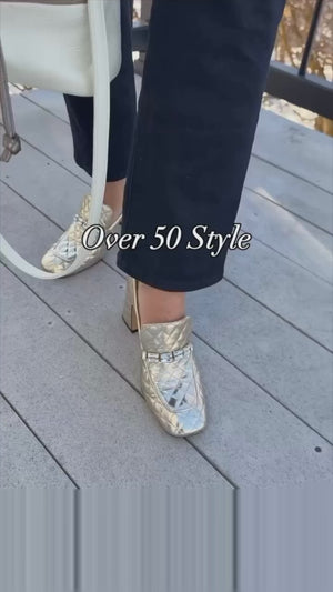 A quilted leather heeled loafer with a square toe and block heel, featuring a decorative band with rectangular gemstone-style embellishments across the upper. Designed by Madison in Beverly Hills and handcrafted in Italy