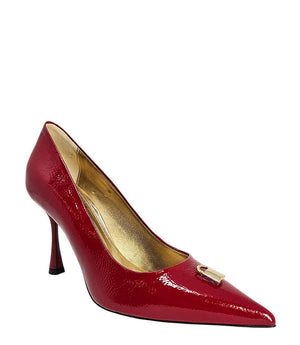 Pointed-toe stiletto pump with a sleek, glossy finish, mid-height heel, and gold lock embellishment at the toe. Features a sculpted silhouette and cushioned interior.