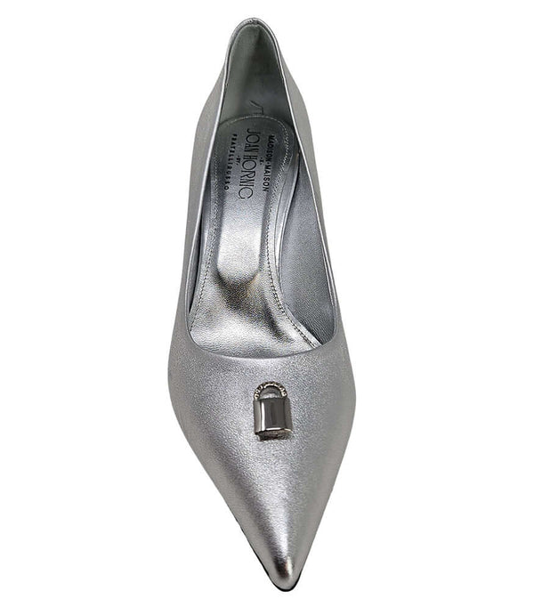 Pointed-toe stiletto pump with a sleek, glossy finish, mid-height heel, and gold lock embellishment at the toe. Features a sculpted silhouette and cushioned interior.