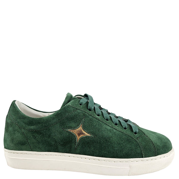Green suede sneaker with a star detail on a white background