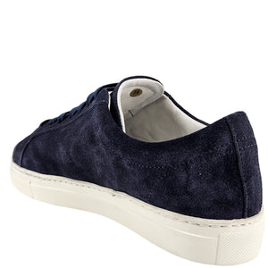 Navy suede sneaker with white sole on a white background