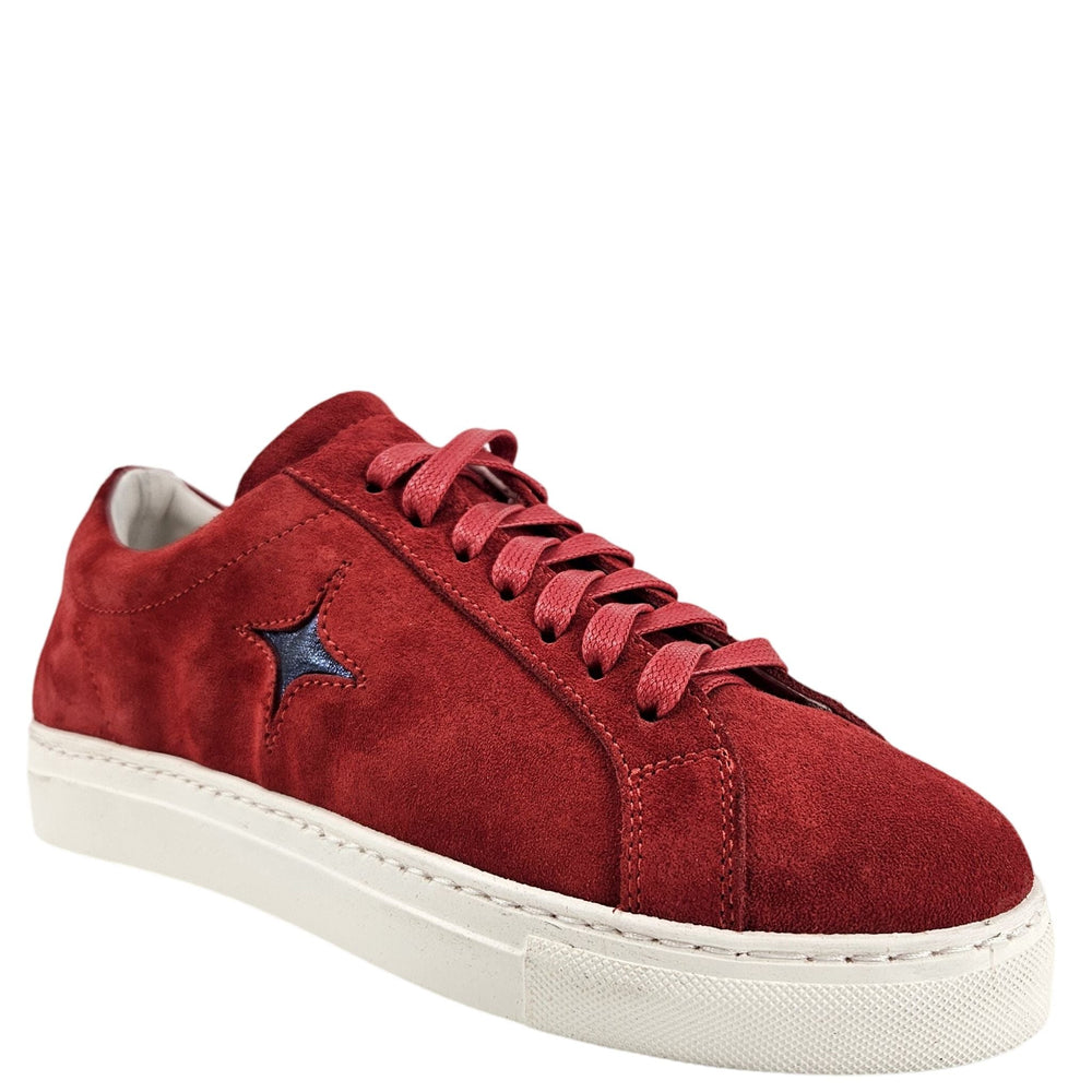 Red suede low-top sneaker with lace-up eyelets and blue star side logo