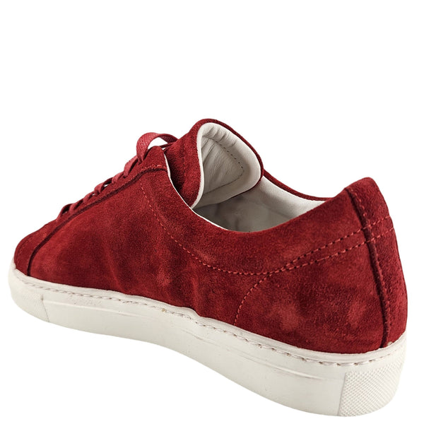 Red suede sneaker with white sole on a white background