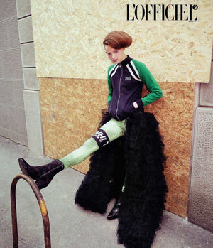 Western-style ankle boot featuring detailed floral embroidery, a pointed toe, side zipper, and angled block heel. Crafted with decorative stitching and a vintage finish.