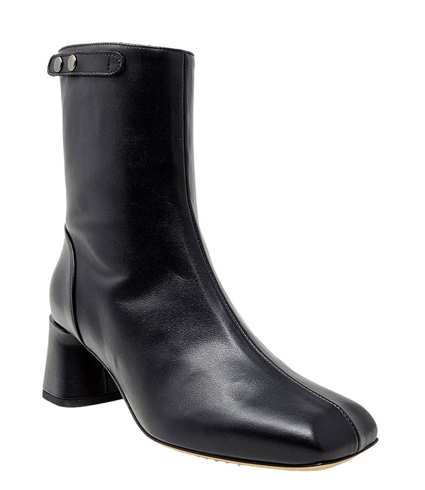 Handcrafted ankle boot made in Italy, designed with a smooth leather finish, square toe, side zipper closure, and a flared block heel. Features a decorative strap with metal accents. Shown from multiple angles against a clean background