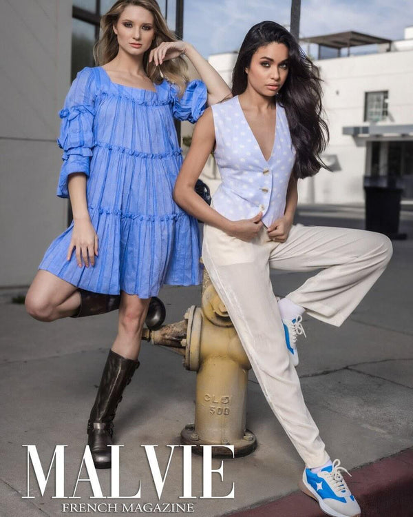 Handcrafted low-top sneaker made in Italy, featuring mixed-material construction with a star-shaped side detail, textured sole, and cushioned laces. Presented from multiple angles against a clean background.