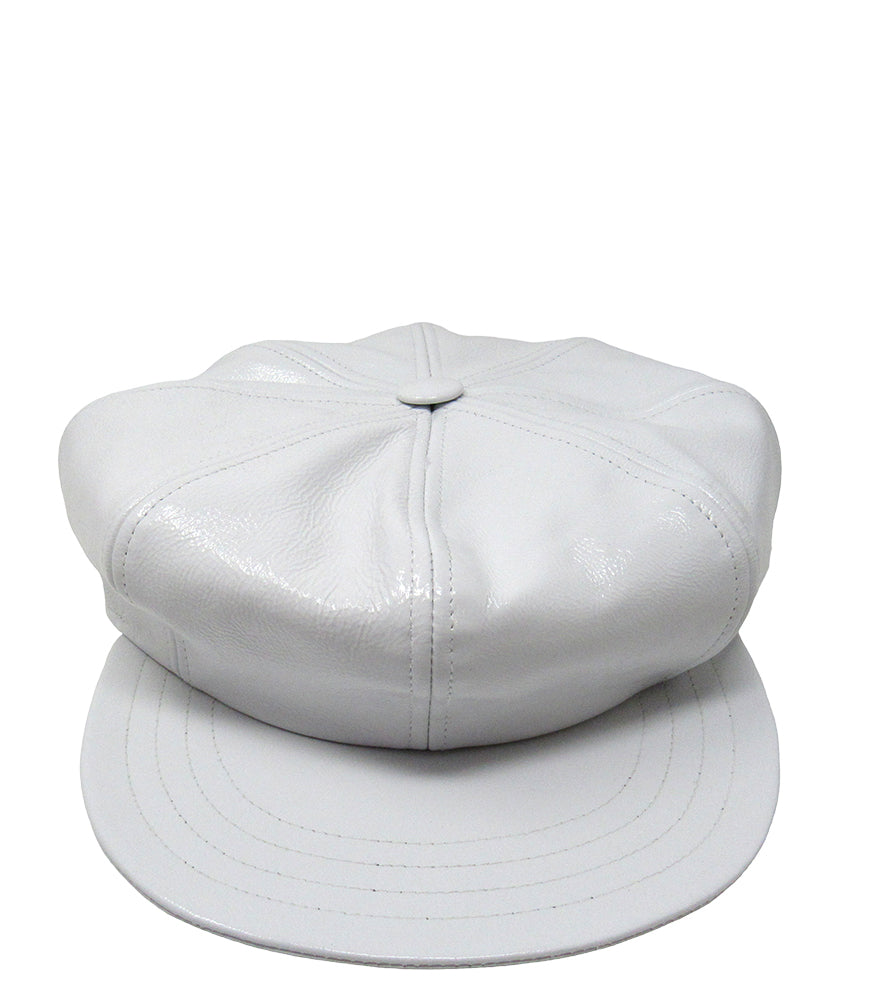 Structured newsboy cap crafted in textured material with panel stitching, a covered button top, and a short curved brim