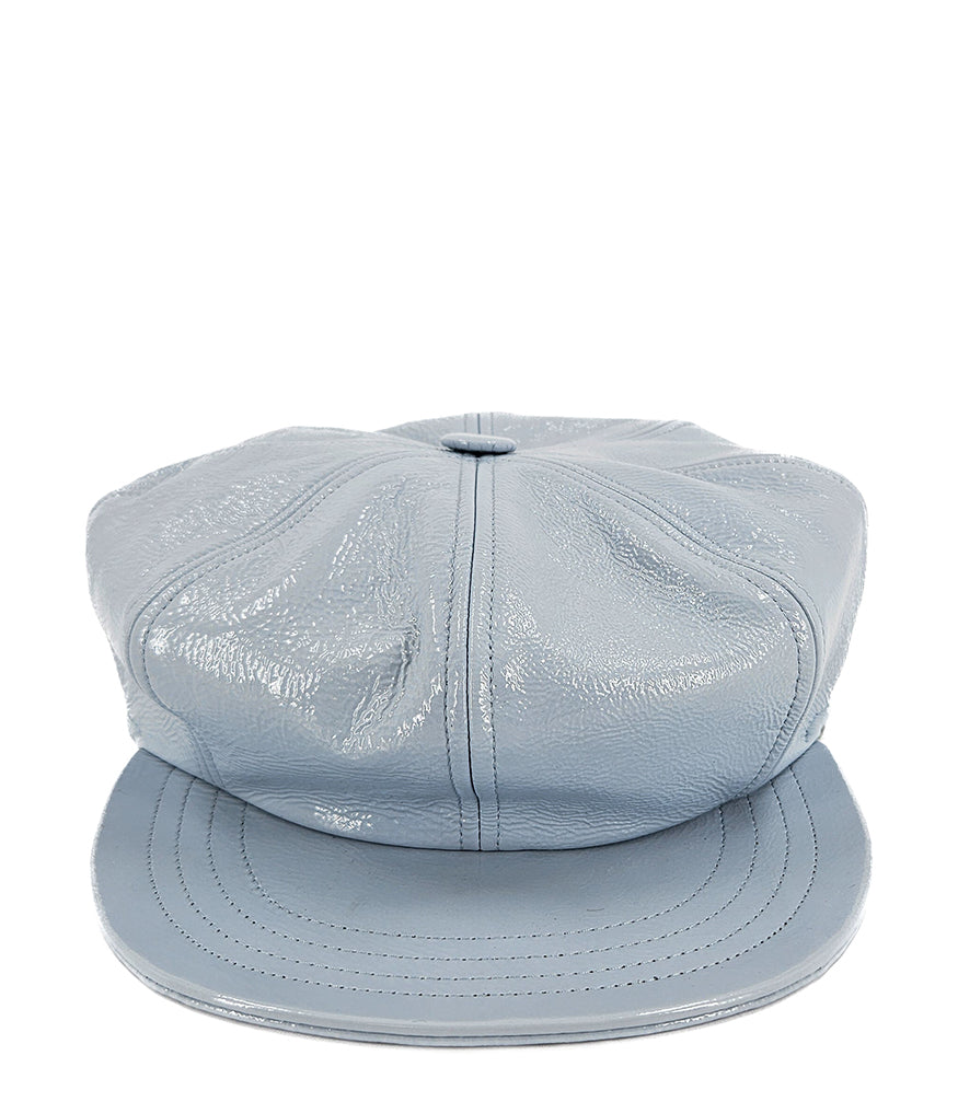Structured newsboy cap crafted in textured material with panel stitching, a covered button top, and a short curved brim
