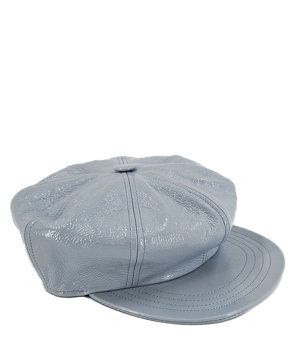 Structured newsboy cap crafted in textured material with panel stitching, a covered button top, and a short curved brim