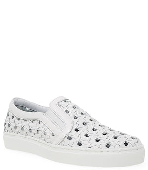 Handmade Italian slip-on sneaker featuring a woven leather upper, elastic side panels for flexibility, and a contrasting flat sole. Shown from multiple angles against a clean background.