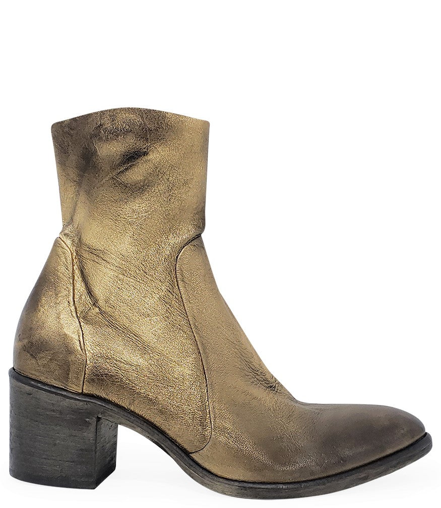 Ankle-height leather boot with a soft sheen finish, block heel, and side zipper closure. Designed with a rounded toe and minimal seam detailing.