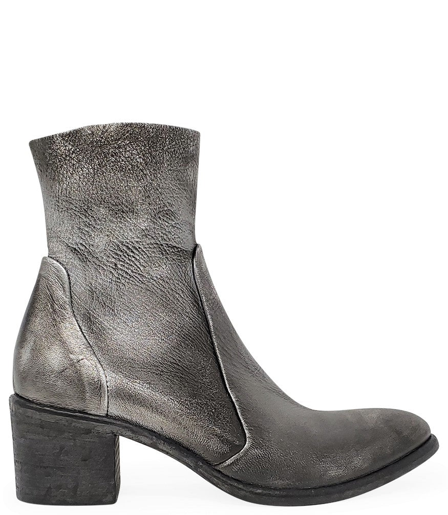 Ankle-height leather boot with a soft sheen finish, block heel, and side zipper closure. Designed with a rounded toe and minimal seam detailing.