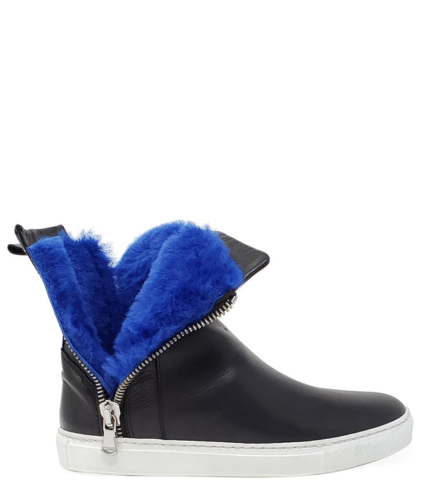 Ankle-high leather sneaker with side zipper closure, cushioned sole, and smooth panel construction. Features a rounded toe, pull tab at the heel, and soft interior lining.