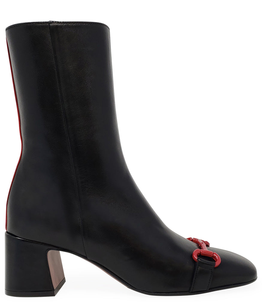 A mid-calf leather boot with a block heel and square toe, featuring a decorative metal accent across the toe. Designed by Madison in Beverly Hills and handcrafted in Italy.