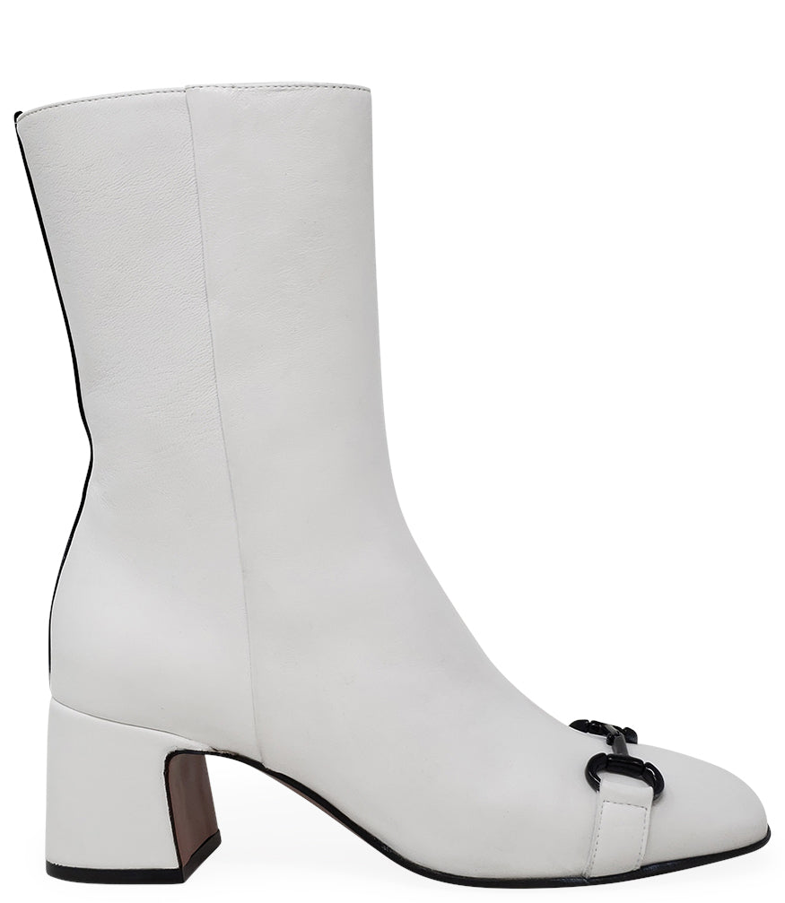 A mid-calf leather boot with a block heel and square toe, featuring a decorative metal accent across the toe. Designed by Madison in Beverly Hills and handcrafted in Italy.