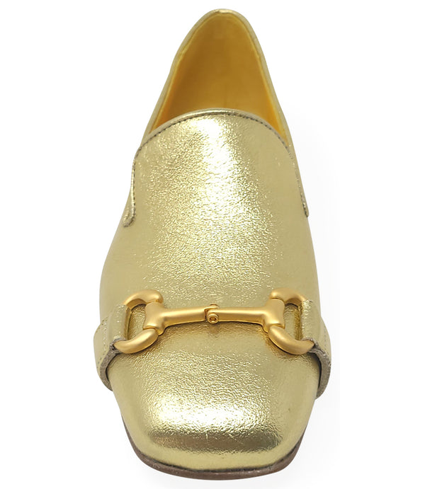 leather loafer with a rounded toe and flat sole, featuring a metal horsebit-style detail across the front. Designed by Madison in Beverly Hills and handcrafted in Italy.
