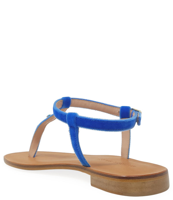 Corn blue jeweled thong sandals with flat design and vibrant embellishments, perfect for summer fashion.