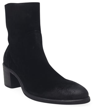 Ankle-height leather boot with a soft sheen finish, block heel, and side zipper closure. Designed with a rounded toe and minimal seam detailing.