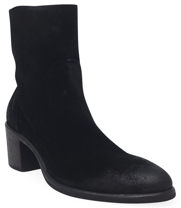 Ankle-height leather boot with a soft sheen finish, block heel, and side zipper closure. Designed with a rounded toe and minimal seam detailing.