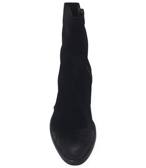 Ankle-height leather boot with a soft sheen finish, block heel, and side zipper closure. Designed with a rounded toe and minimal seam detailing.
