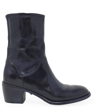 Mid-calf leather boot with rounded toe, block heel, and natural creasing for a worn-in effect. Features minimal seam detailing