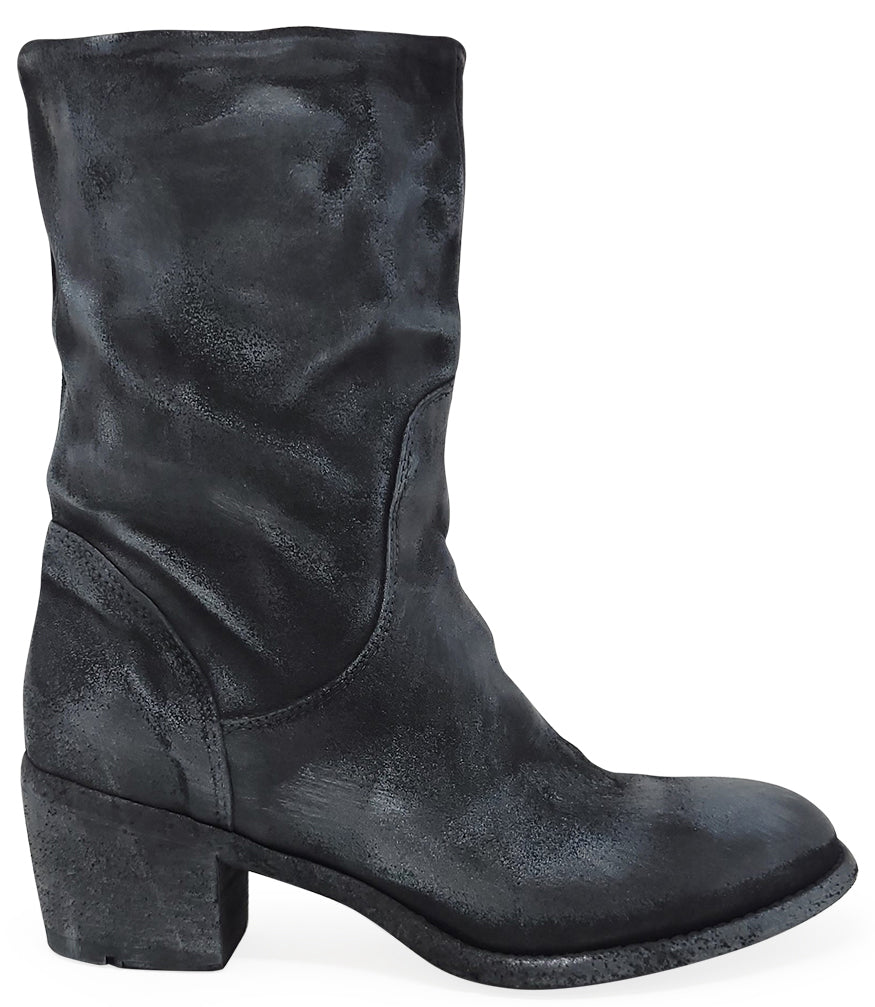 Mid-calf boot with a matte distressed finish, block heel, and rounded toe. Features a relaxed shaft and minimal seam lines.