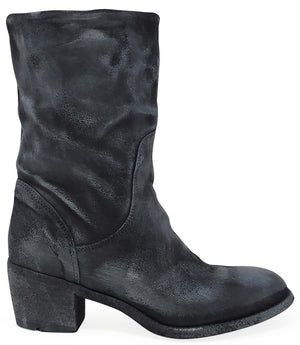 Mid-calf boot with a matte distressed finish, block heel, and rounded toe. Features a relaxed shaft and minimal seam lines.