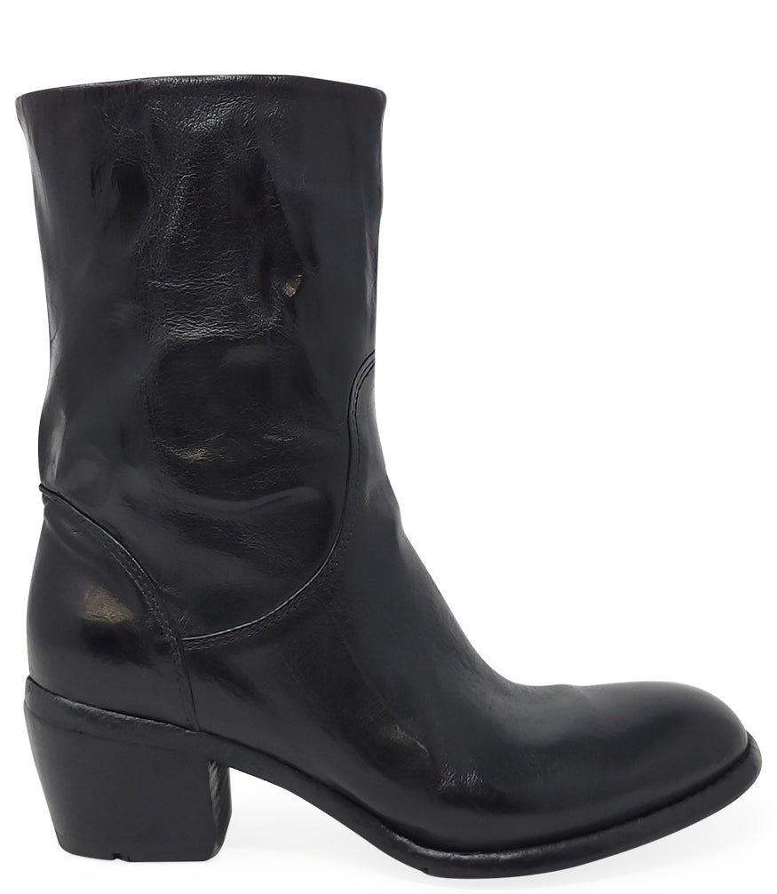 Mid-calf leather boot with rounded toe, block heel, and natural creasing for a worn-in effect. Features minimal seam detailing