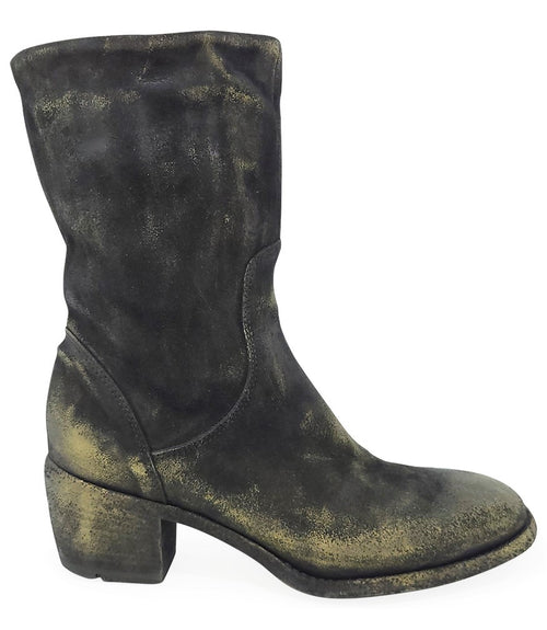 Mid-calf boot with a matte distressed finish, block heel, and rounded toe. Features a relaxed shaft and minimal seam lines.