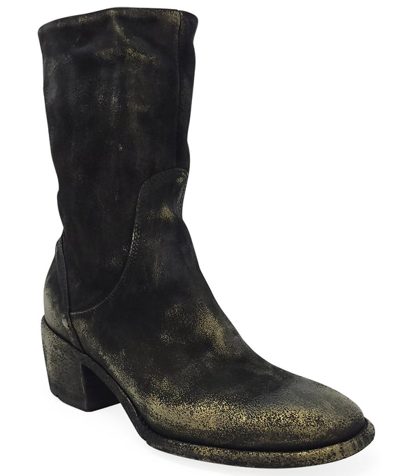 Mid-calf boot with a matte distressed finish, block heel, and rounded toe. Features a relaxed shaft and minimal seam lines.