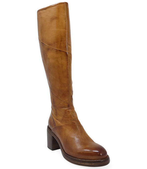 "Knee-high leather boot with structured shaft, rounded toe, and stacked block heel. Designed with minimal stitching and a smooth finish