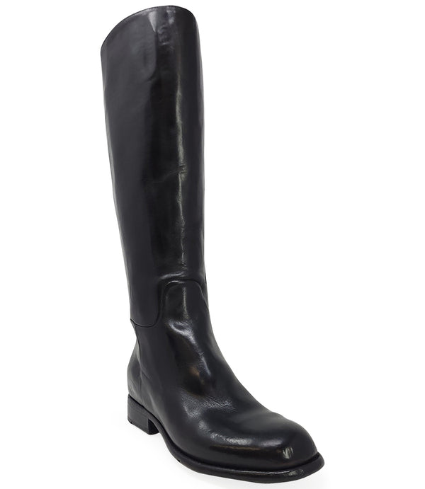 "Knee-high leather boot with structured shaft, rounded toe, and stacked block heel. Designed with minimal stitching and a smooth finish