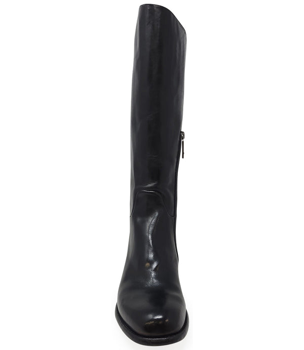 "Knee-high leather boot with structured shaft, rounded toe, and stacked block heel. Designed with minimal stitching and a smooth finish