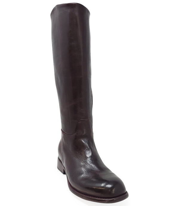 "Knee-high leather boot with structured shaft, rounded toe, and stacked block heel. Designed with minimal stitching and a smooth finish