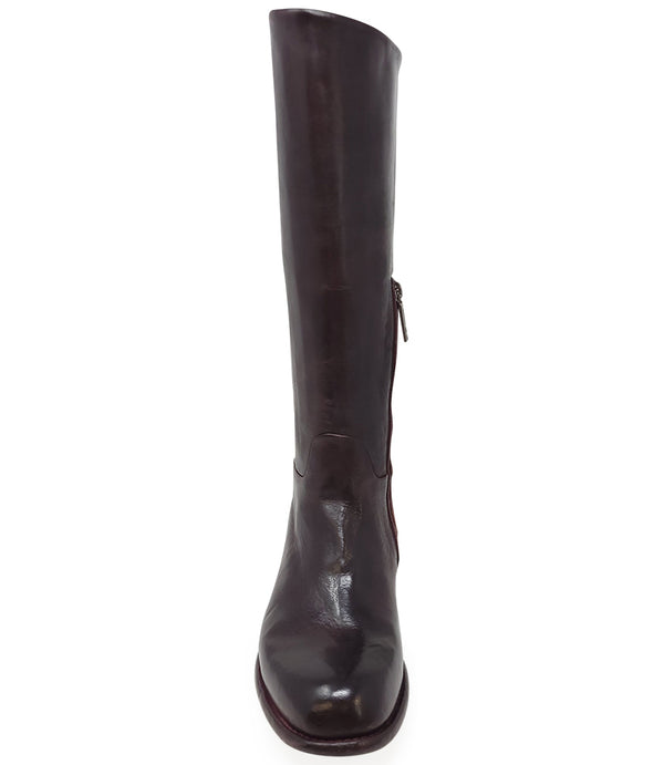 "Knee-high leather boot with structured shaft, rounded toe, and stacked block heel. Designed with minimal stitching and a smooth finish
