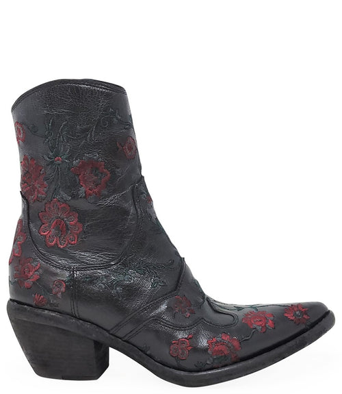 Western-style ankle boot featuring detailed floral embroidery, a pointed toe, side zipper, and angled block heel. Crafted with decorative stitching and a vintage finish.
