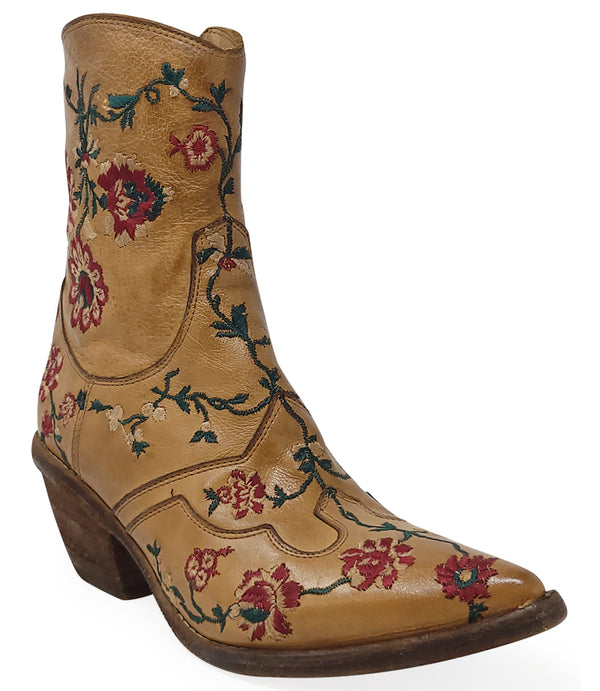 Western-style ankle boot featuring detailed floral embroidery, a pointed toe, side zipper, and angled block heel. Crafted with decorative stitching and a vintage finish.