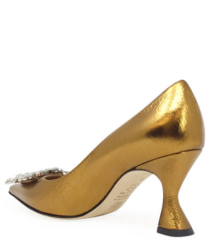 Pointed-toe pump crafted from premium leather with a softly crinkled finish, featuring an embellished jeweled buckle at the toe and a sculpted flared kitten heel. Designed with a leather-lined interior and a leather outsole for comfort and durability. Ele