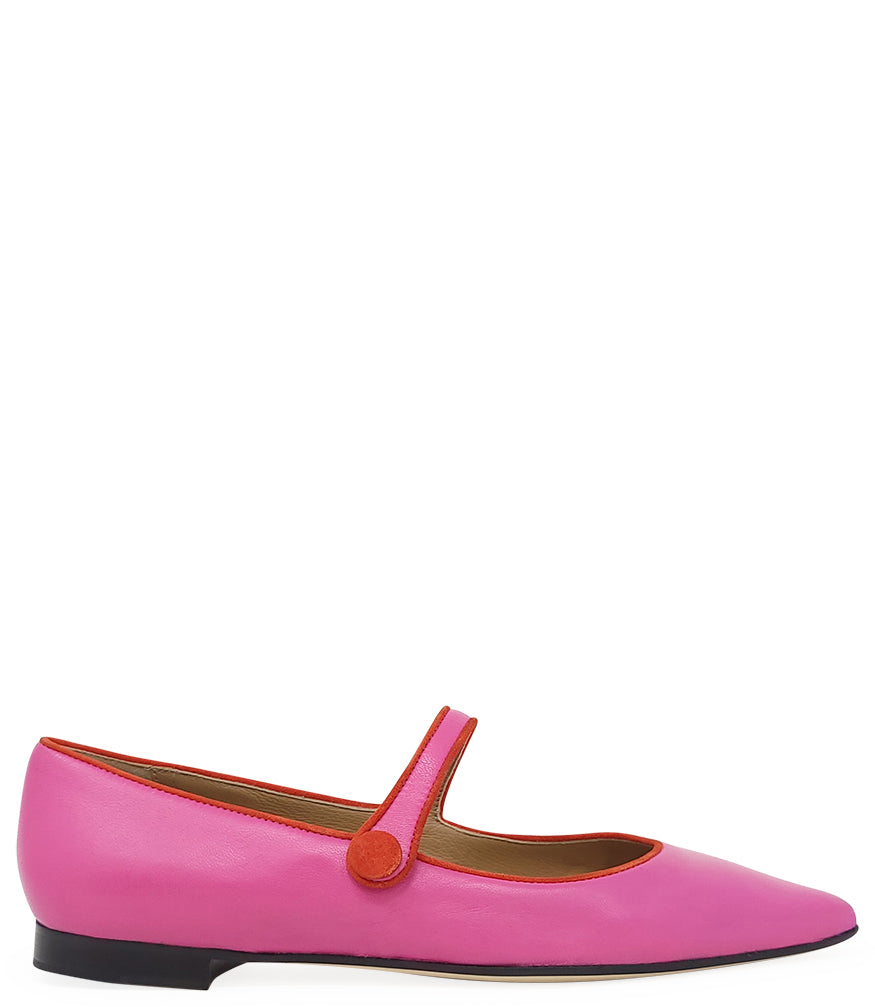Pointed-toe Mary Jane flat crafted from smooth leather with contrast trim detailing and a single buttoned strap across the instep. Features a leather-lined interior, cushioned footbed for comfort, and a low stacked heel for everyday wear. Contemporary, pl