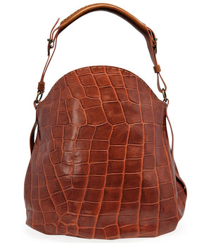 "Large hobo-style shoulder bag crafted from premium leather with an all-over crocodile-embossed texture. Features a wide, adjustable leather shoulder strap with metal hardware and an open top for easy access. Softly structured body designed for a relaxed