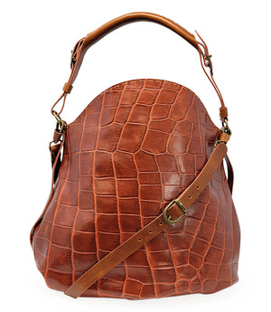 "Large hobo-style shoulder bag crafted from premium leather with an all-over crocodile-embossed texture. Features a wide, adjustable leather shoulder strap with metal hardware and an open top for easy access. Softly structured body designed for a relaxed