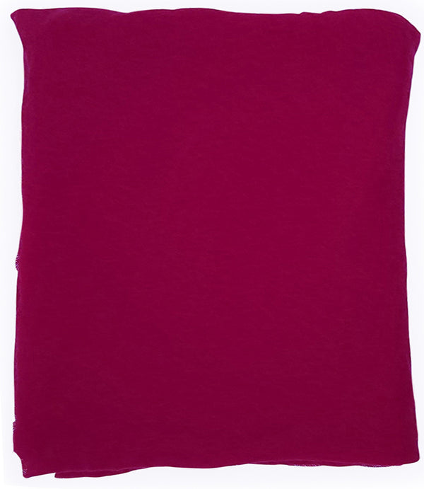 A lightweight, rectangular scarf with soft texture and raw edges, draped to show length and fluidity