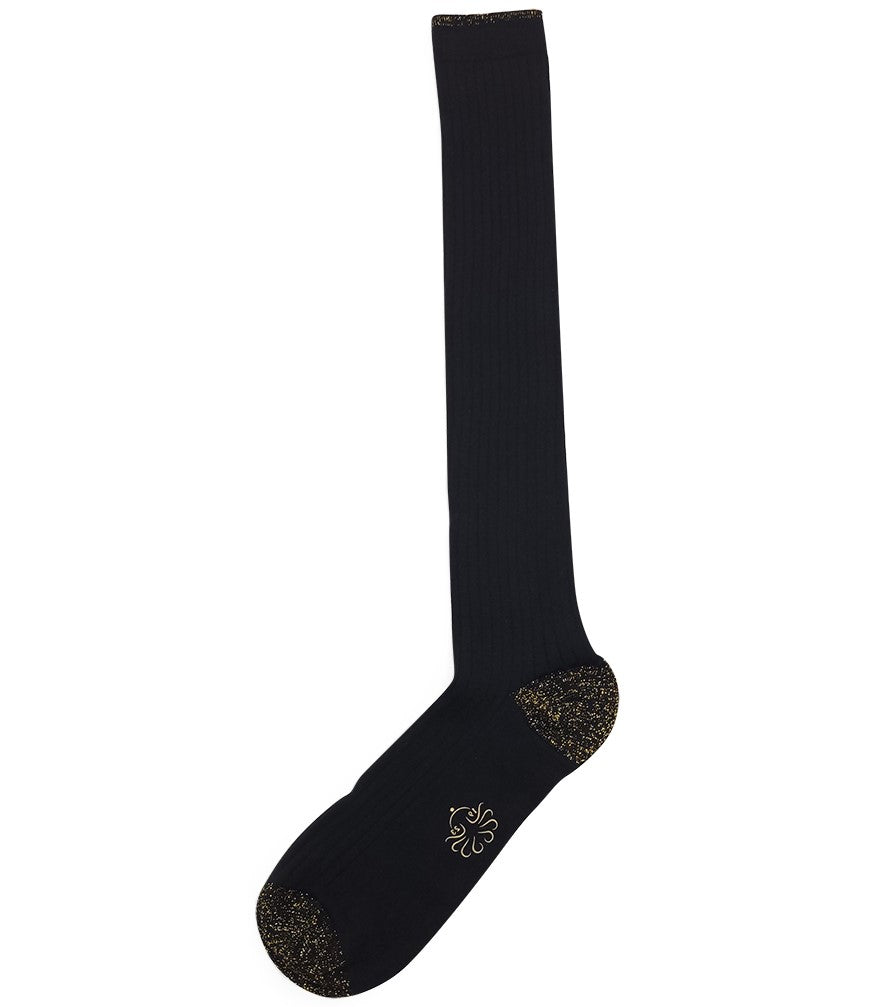 A mid-calf knit sock featuring a mix of textured panels, ribbed leg section, and bold horizontal stripes around the arch and cuff.