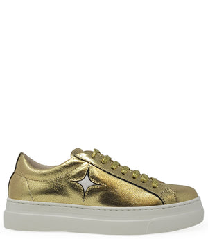 Low-top luxury sneaker featuring a smooth leather upper with a metallic finish, a signature star-shaped side detail, padded collar, lace-up front, and a thick rubber platform sole. Designed with a leather-lined interior and cushioned footbed for enhanced