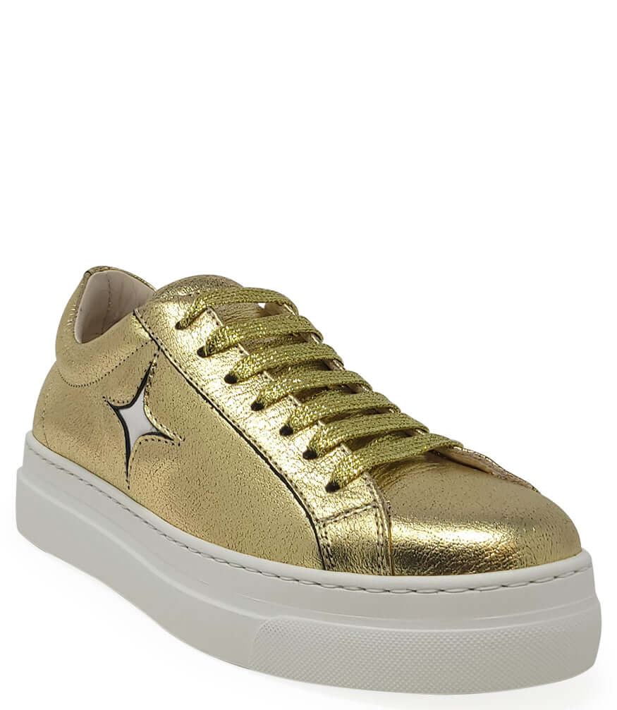 Gold metallic leather low-top sneaker with star logo and white platform sole