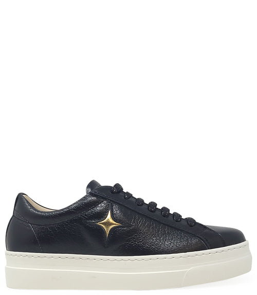 Low-top luxury sneaker featuring a smooth leather upper with a metallic finish, a signature star-shaped side detail, padded collar, lace-up front, and a thick rubber platform sole. Designed with a leather-lined interior and cushioned footbed for enhanced