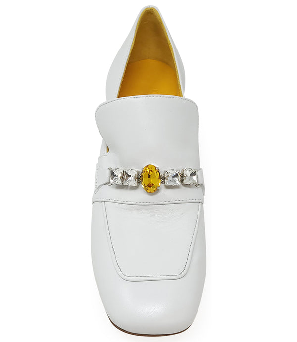A leather heeled loafer with a block heel and square toe, featuring a decorative band with faceted gemstone-style embellishments across the upper. Designed by Madison in Beverly Hills and handcrafted in Italy.